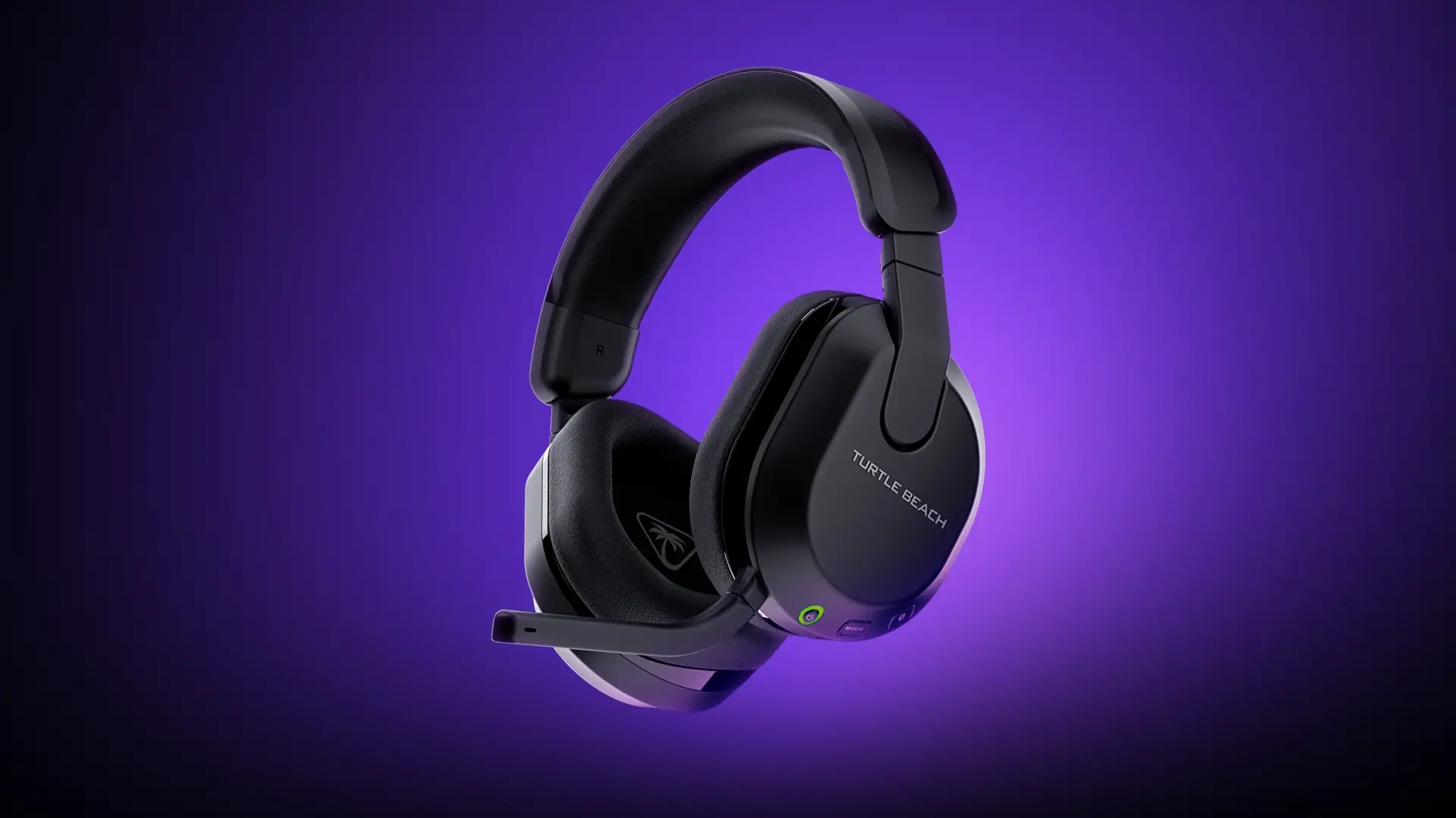 1-Stealth600-XB-BLK Et par sorte over-ear-headset med indbygget mikrofon, svævende mod en lilla baggrund.